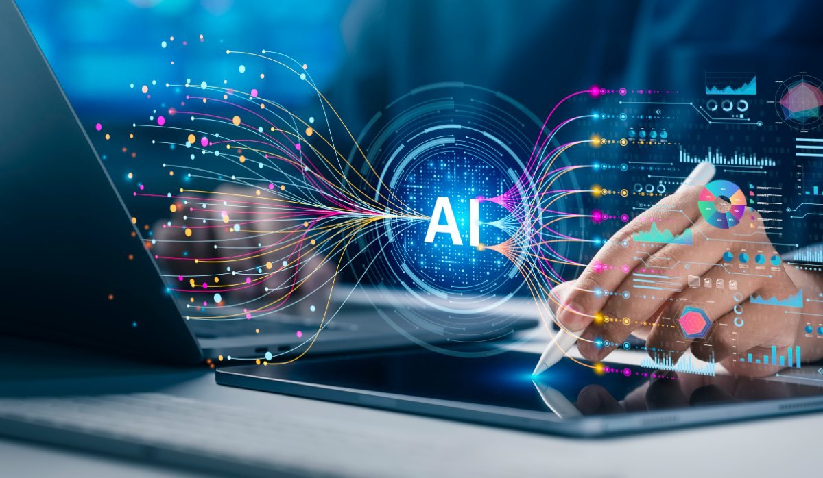 Laptop with a digital overlay: tangled, colourful data lines converge in an AI node and emerge on the right as ordered analytics